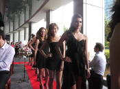 The contestants take their places on the red carpet for the final catwalk of the day. (Yahoo! Singapore/ Deborah Choo)