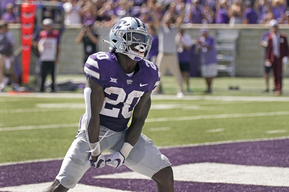 Kansas State running back Joe Ervin (20) celebrates after scoring a touchdown during the first half of an NCAA college football game against Nevada on Saturday, Sept. 18, 2021, in Manhattan, Kan. (AP Photo/Charlie Riedel)