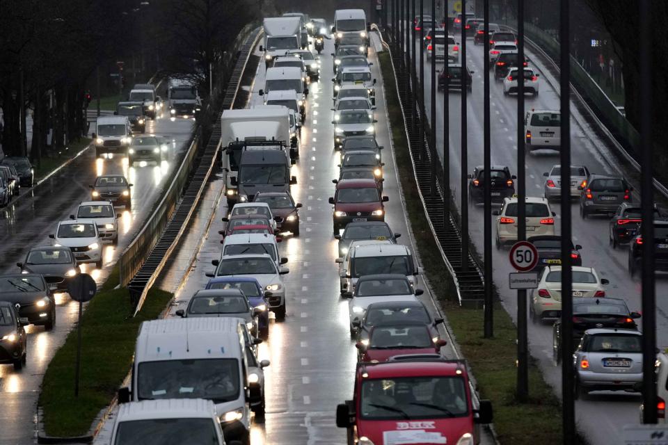 Cars and trucks are stuck in a traffic jam on a highway during a nationwide public transport strike in Munich, Germany, Monday, March 27, 2023. (AP Photo/Matthias Schrader)