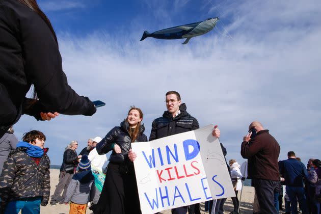 Offshore wind energy opponents gather during a 