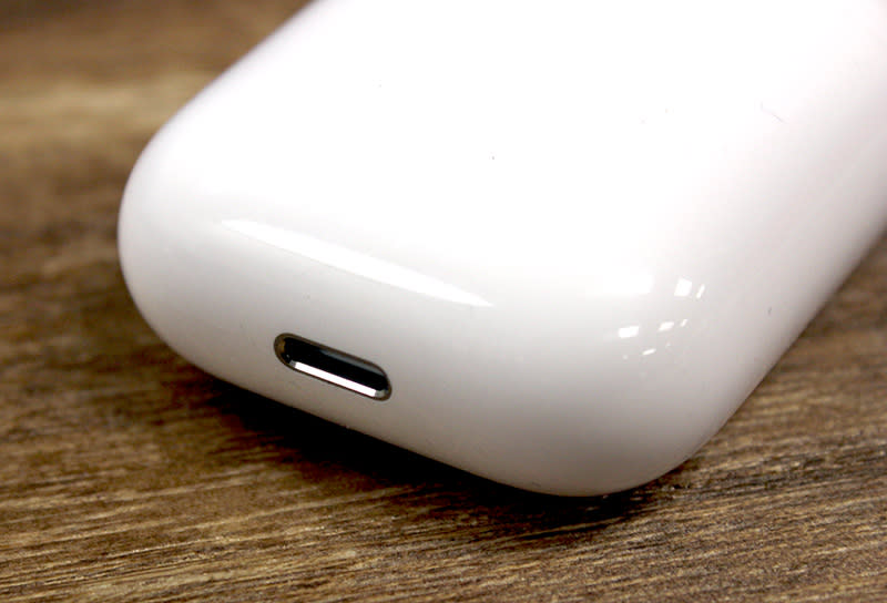 The charging case charges via a Lightning port.