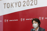 Tokyo 2020 President Seiko Hashimoto speaks during a five-party online meeting at Harumi Island Triton Square Tower Y in Tokyo Monday, June 21, 2021. The Tokyo Olympics will allow some local fans to attend when the games open in just over a month, Tokyo organizing committee officials and the IOC said on Monday. (Rodrigo Reyes Marin/Pool Photo via AP)