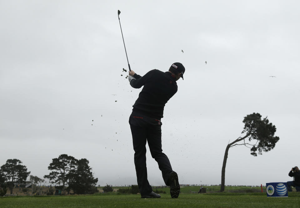 Jimmy Walker hits from the fifth tee during the final round of the AT&T Pebble Beach Pro-Am golf tournament, Sunday, Feb. 9, 2014, in Pebble Beach, Calif. (AP Photo/Eric Risberg)