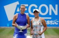 Tennis - WTA Premier - Aegon Classic - Edgbaston Priory Club, Birmingham, Britain - June 25, 2017 Czech Republic's Petra Kvitova (L) celebrates winning the final by posing for a photograph with Australia's Ashleigh Barty (R) as they hold their trophies Action Images via Reuters/Peter Cziborra