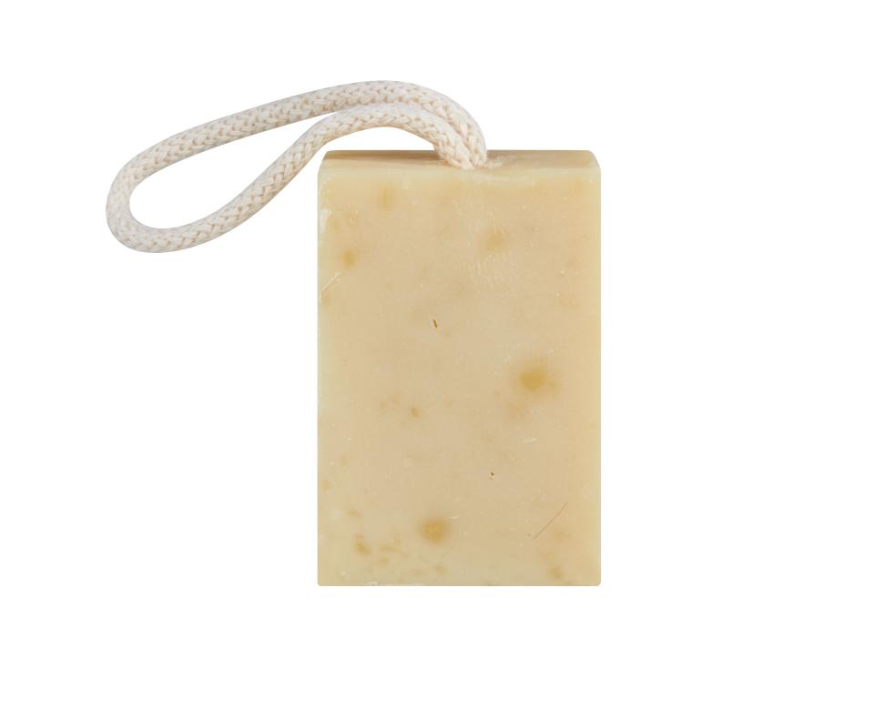 A rectangular soap bar with a looped rope attached to one end