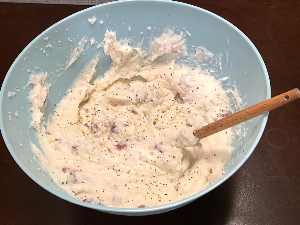 Mixing Ina Garten's smashed potatoes