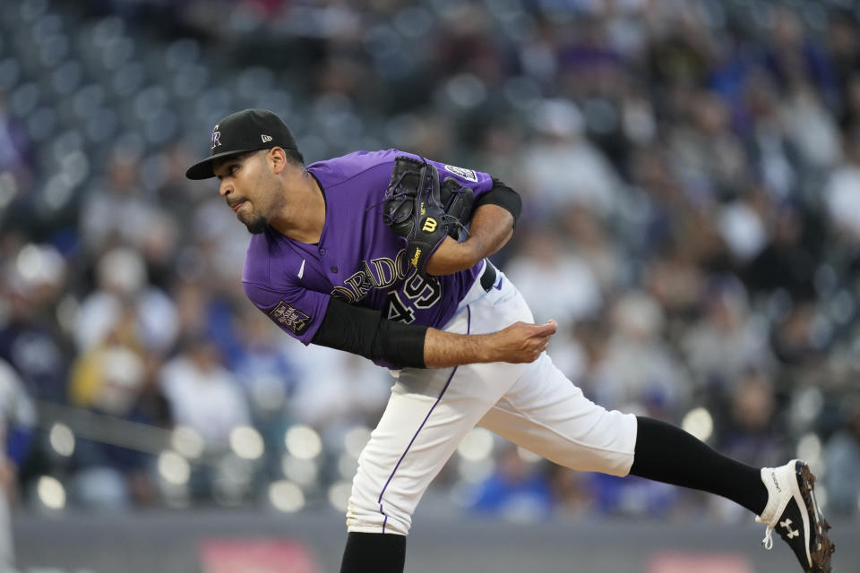 Colorado Rockies starting pitcher Antonio Senzatela works against the Los Angeles Dodgers in the first inning of a baseball game Tuesday, Sept. 21, 2021, in Denver. (AP Photo/David Zalubowski)