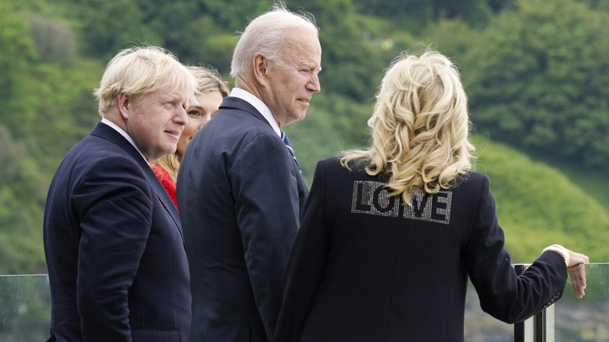 President Biden and first lady Jill Biden walk with British Prime Minister Boris Johnson and his wife, Carrie Johnson, ahead of the G-7 summit, Thursday. (AP Photo/Patrick Semansky)