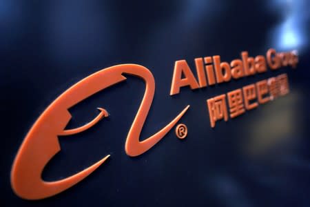 FILE PHOTO: FILE PHOTO: A logo of Alibaba Group is seen at an exhibition during the World Intelligence Congress in Tianjin