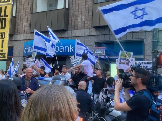 Pro-Israel demonstrators opposed the pro-Palestinian protest near the Israeli Consulate in San Francisco on Sunday, Oct. 8, 2023,. Supporters of Israel and Palestinian cause gathered in several U.S. cities Sunday over the attacks that have killed hundreds and injured thousands in the Middle East.