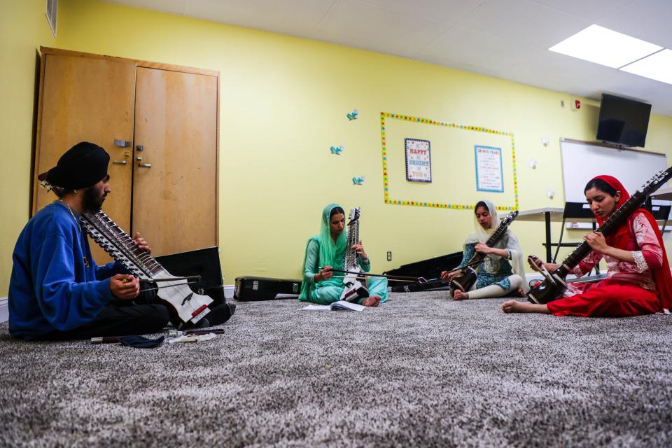 Makheer Singh, left, teaches to his advanced class at the Khasala Academy in Riverside on April 22, 2023.