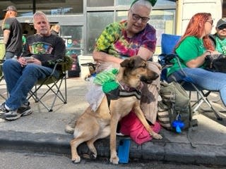 Becca Rush and the adoptable Brody Girl lined up on Bull Street to see the parade, and possibly a forever-home for the puppy.