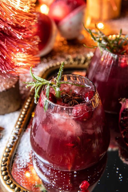 <p>Half Baked Harvest</p><p>A festive party punch with pomegranate juice, orange juice, cranberry and lime.</p><p><strong>Get the recipe: <a href="https://www.halfbakedharvest.com/christmas-pomegranate-punch/" rel="nofollow noopener" target="_blank" data-ylk="slk:Christmas Pomegranate Punch;elm:context_link;itc:0;sec:content-canvas" class="link rapid-noclick-resp">Christmas Pomegranate Punch</a></strong></p>
