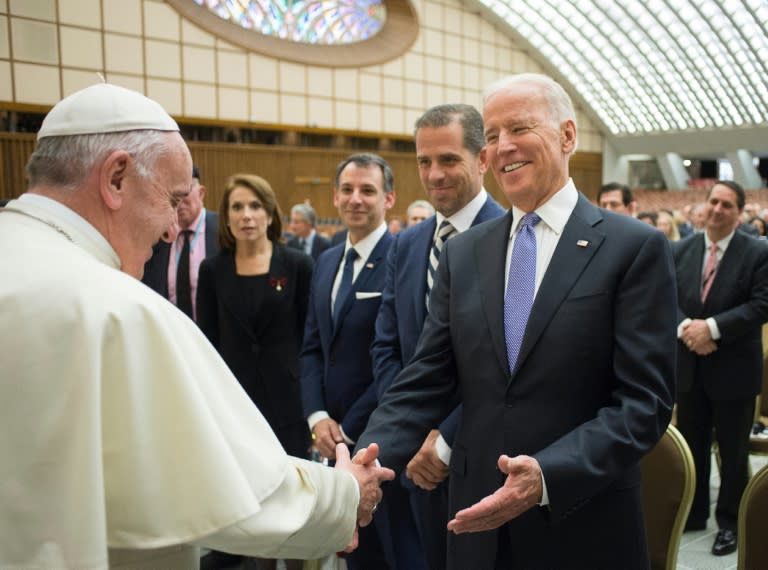 This picture released by the Vatican press office shows Pope Francis (L) shaking hands with US Vice President Joe Biden on April 29, 2016 at the Vatican