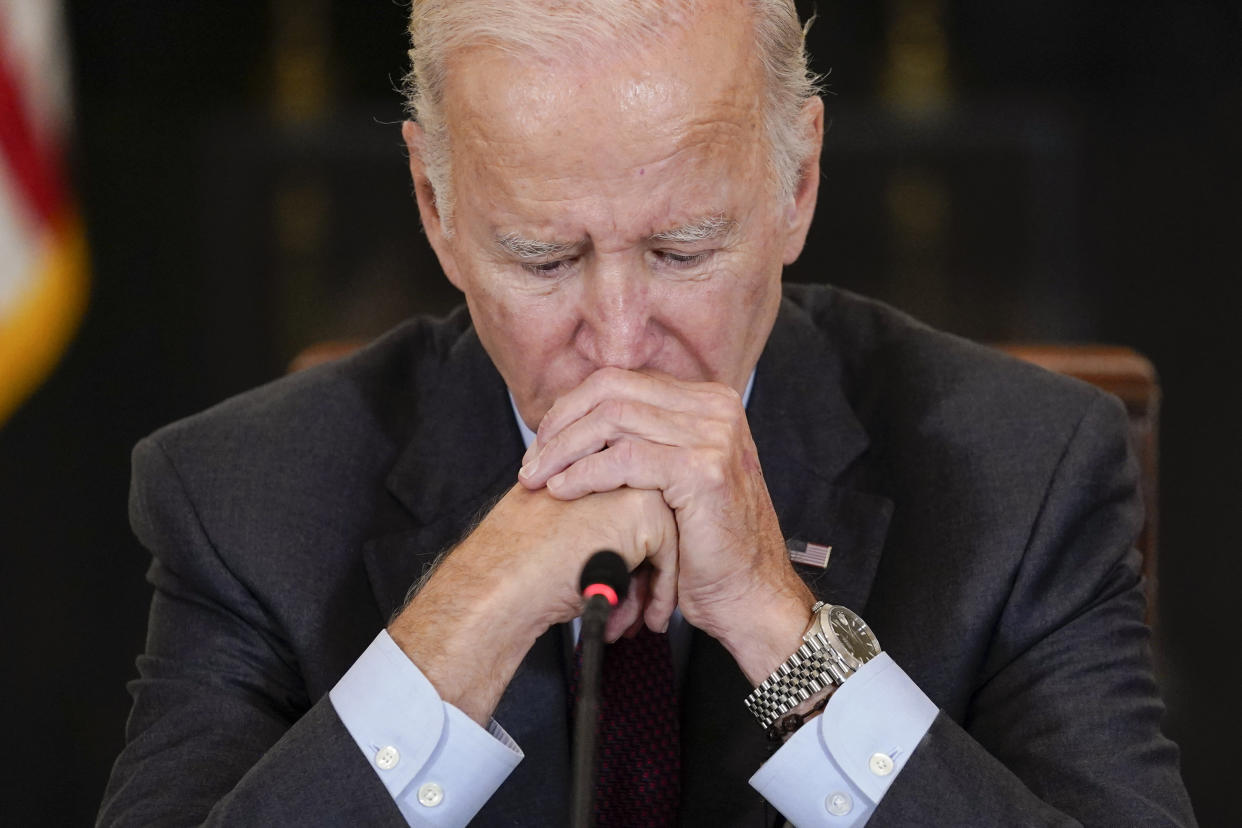 President Joe Biden listens to doctors speak during a meeting of the reproductive rights task force in the State Dining Room of the White House in Washington, Tuesday, Oct. 4, 2022. (Susan Walsh/AP)