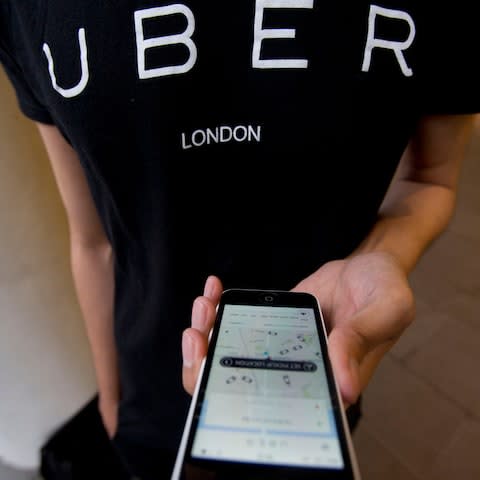 Uber user - Credit: Yui Mok/PA