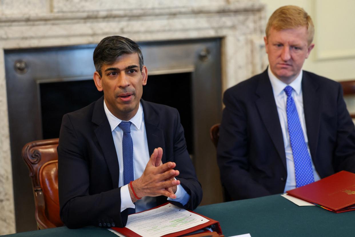 Rishi Sunak with Deputy Prime Minister Oliver Dowden during an Illegal Migration Operations Committee meeting this morning (Toby Melville/PA Wire)