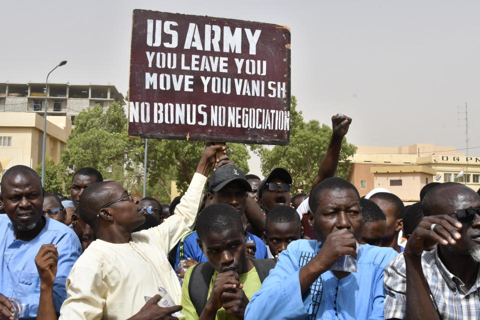 Protesters hold up a sign demanding that U.S. troops leave Niger immediately during a demonstration in Niamey, Niger, April 13, 2024. / Credit: AFP via Getty