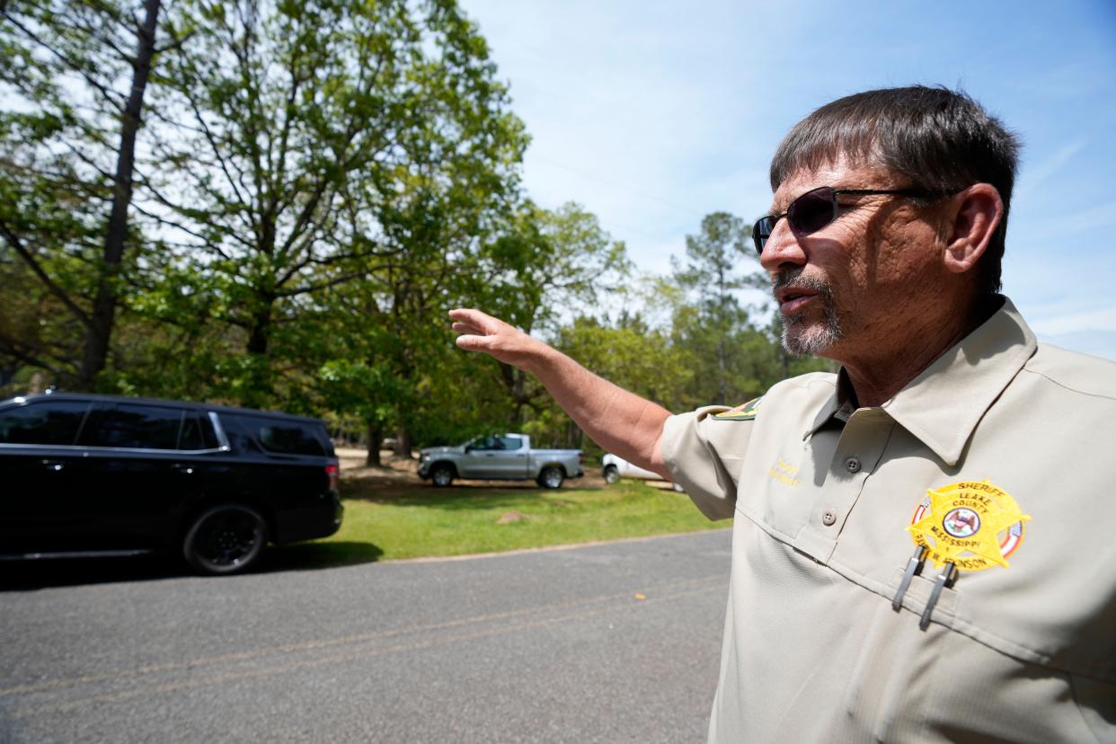 Leake County Sheriff Randy Atkinson points to the site of a fire ravaged house where authorities believe one of the four Hinds County jail escapees is thought to be dead, after engaging in a shootout and barricading himself inside a burning home in Conway, Miss., Wednesday morning, April 26, 2023. (AP)