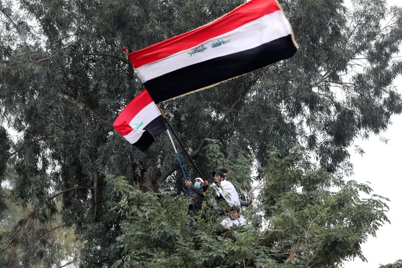 Supporters of Iraqi Shi'ite cleric Moqtada al-Sadr protest against what they say is U.S. presence and violations in Iraq, during a demonstration in Baghdad