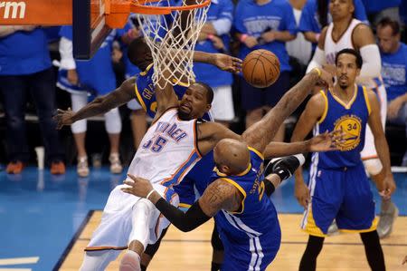 May 28, 2016; Oklahoma City, OK, USA; Oklahoma City Thunder forward Kevin Durant (35) is fouled by Golden State Warriors center Marreese Speights (5) during the fourth quarter in game six of the Western conference finals of the NBA Playoffs at Chesapeake Energy Arena. Mandatory Credit: Mark D. Smith-USA TODAY Sports