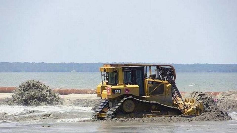 In this file photo, Weeks Marine, Inc. pushes sand while working on the Town of Hilton Head Island’s beach renourishment project in June 2016.