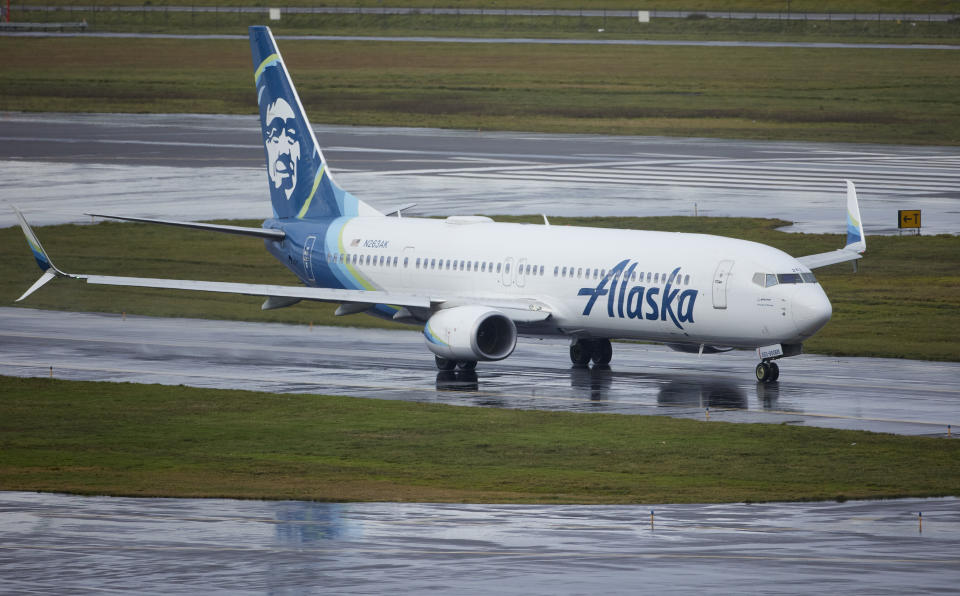 Alaska Airlines flight 1276, a Boeing 737-900, taxis before takeoff from Portland International Airport in Portland, Ore., Saturday, Jan. 6, 2024. The FAA has ordered the temporary grounding of Boeing 737 MAX 9 aircraft after part of the fuselage blew out during a flight. (AP Photo/Craig Mitchelldyer)