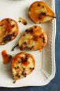 <p>That drizzle on top? It's a combo of sugar, cinnamon, butter, and — surprise! — a splash of white wine.</p><p><em><a href="https://www.goodhousekeeping.com/food-recipes/dessert/a23643792/baked-pear-with-cinnamon-and-currants-recipe/" rel="nofollow noopener" target="_blank" data-ylk="slk:Get the recipe for Baked Pear with Cinnamon and Currants »;elm:context_link;itc:0;sec:content-canvas" class="link ">Get the recipe for Baked Pear with Cinnamon and Currants »</a></em></p>