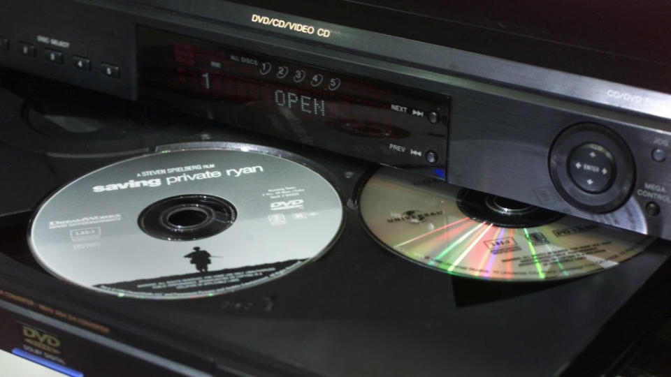 DVD player with 'Saving Private Ryan' disc partially ejected