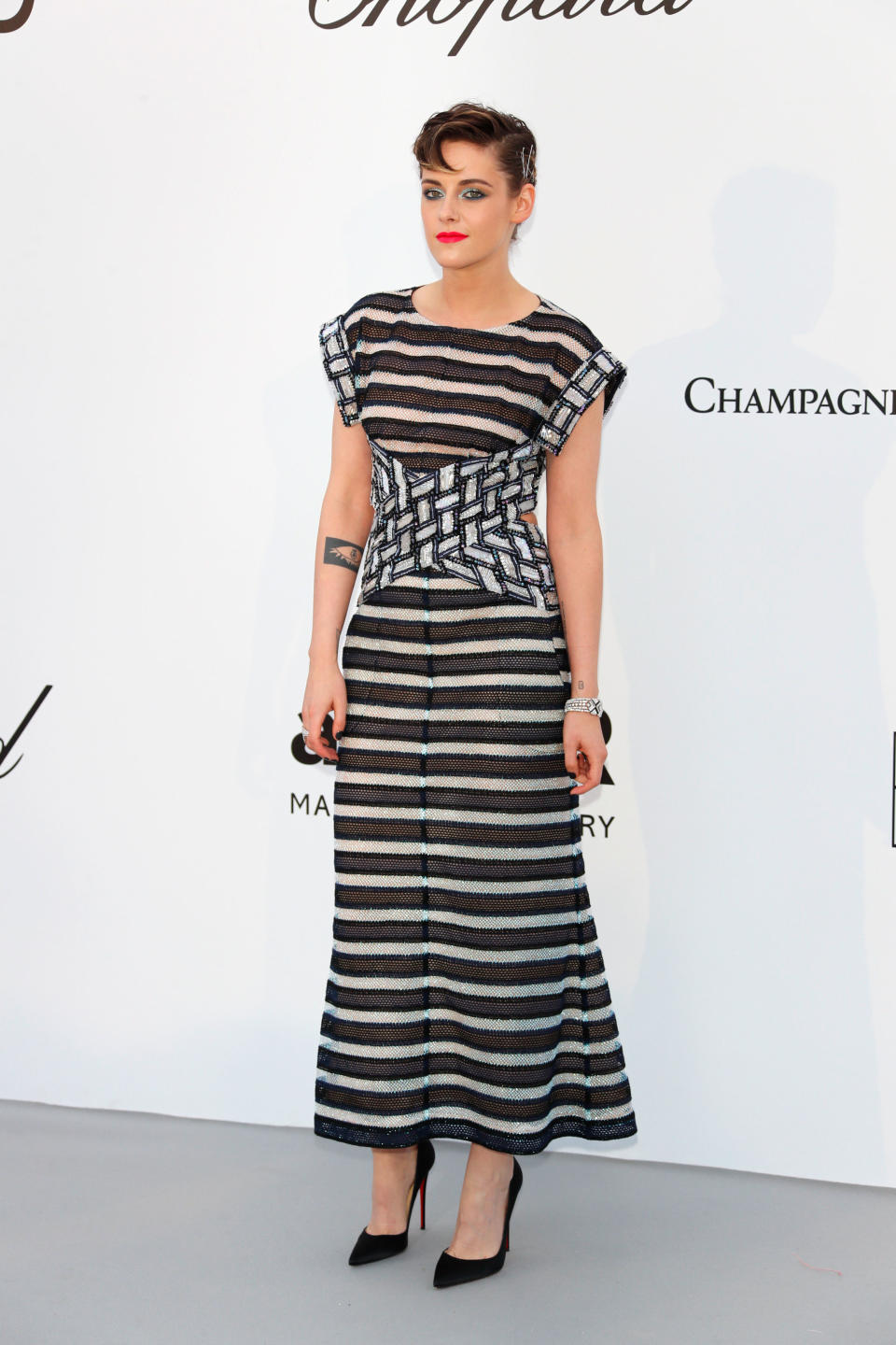 <p>Kristen Stewart saved her best look until last, as she donned monochrome Chanel stripes at the amfAR Gala during Cannes Film Festival. <em>[Photo: Getty]</em> </p>