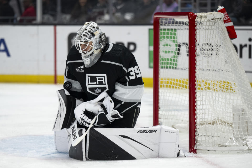 Los Angeles Kings goaltender Cam Talbot (39) blocks a shot during the first period of an NHL hockey game against the Vancouver Canucks, Tuesday, March 5, 2024, in Los Angeles. (AP Photo/Kyusung Gong)