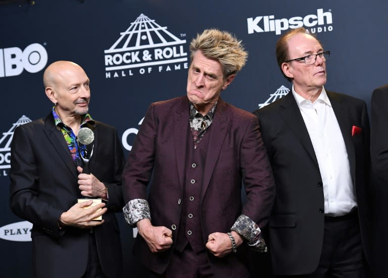 Inductees Steve Smith, Ross Valory and Aynsley Dunba of Journey pose at the 31st Annual Rock And Roll Hall of Fame Induction Ceremony at Barclays Center