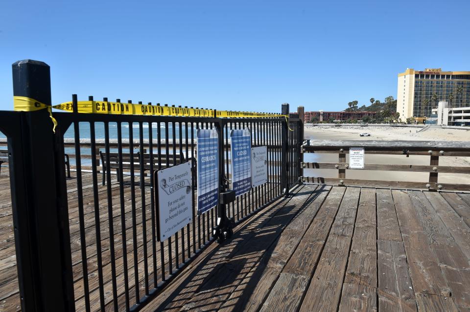 The Ventura Pier has been closed as government agencies urge the public to exercise social distancing to curb the spread of COVID-19.