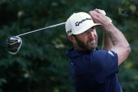 Dustin Johnson tees off on the ninth hole during the final round of the Northern Trust golf tournament at TPC Boston, Sunday, Aug. 23, 2020, in Norton, Mass. (AP Photo/Charles Krupa)