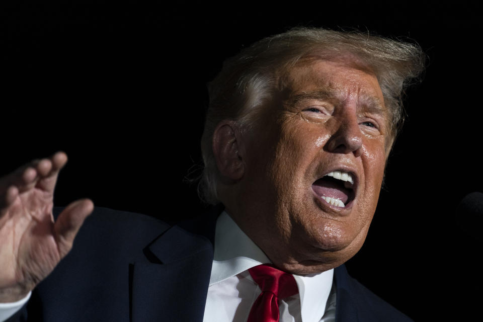 President Donald Trump speaks during a campaign rally at Orlando Sanford International Airport, Monday, Oct. 12, 2020, in Sanford, Fla. (AP Photo/Evan Vucci)