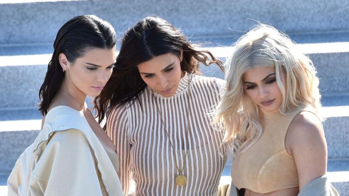 Kim Kardashian and Kylie Jenner look identical wearing tight leggings and  high heels from Kayne West's Yeezy line in LA