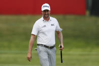 Webb Simpson smiles after making par on the 18th hole during the second round of the Rocket Mortgage Classic golf tournament, Friday, July 3, 2020, at the Detroit Golf Club in Detroit. (AP Photo/Carlos Osorio)