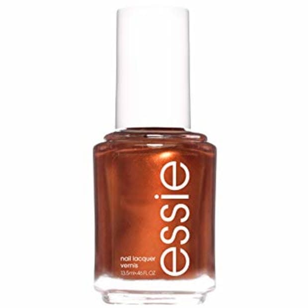 <p>Essie Nail Polish in Rust Worthy, $9, <a href="https://shop-links.co/1687123407964230457" rel="nofollow noopener" target="_blank" data-ylk="slk:available here;elm:context_link;itc:0;sec:content-canvas" class="link ">available here</a>.</p>