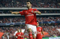 Benfica's Pizzi celebrates scoring his side's first goal from a penalty kick during the Champions League playoffs, first leg, soccer match between Benfica and PAOK at the Luz stadium in Lisbon, Tuesday, Aug. 21, 2018. (AP Photo/Armando Franca)