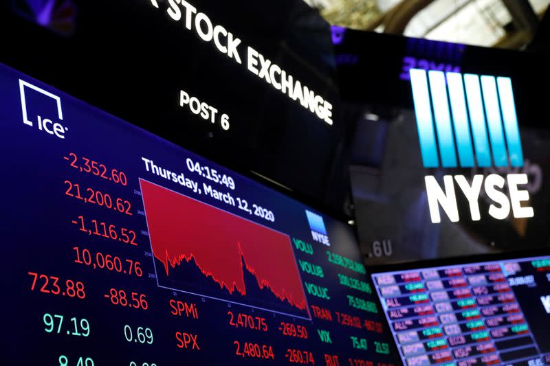 A price screen display is seen above the floor of the New York Stock Exchange (NYSE) after the close of trading in New York