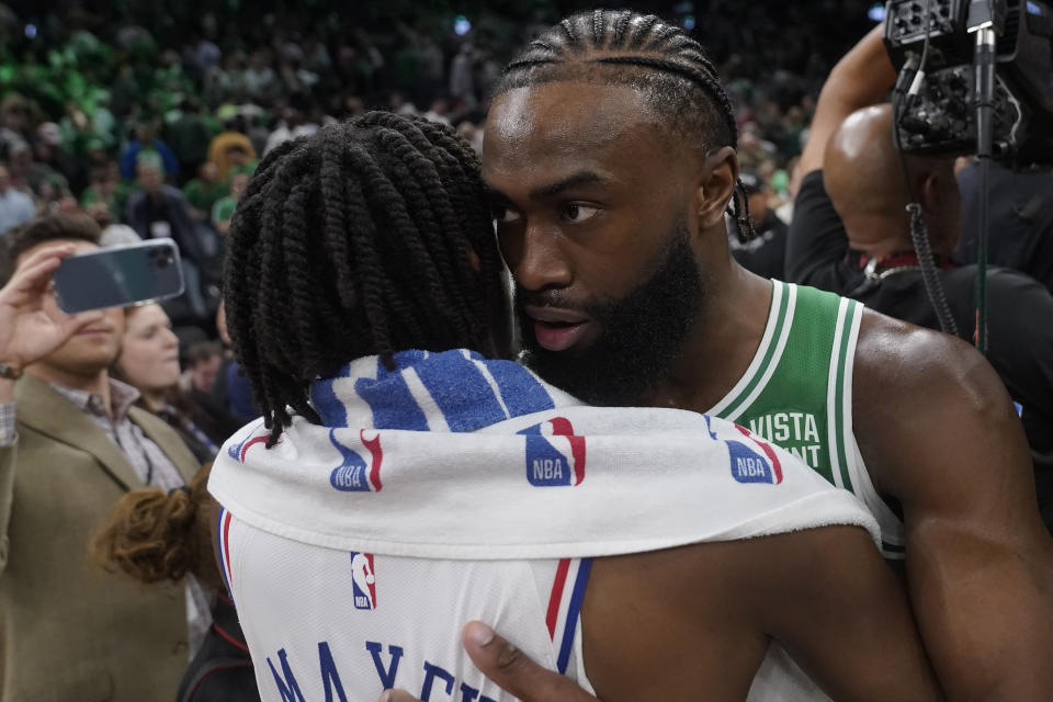 Boston Celtics guard Jaylen Brown, right, greets Philadelphia 76ers guard Tyrese Maxey, left, after the Celtics defeated the 76ers in Game 7 in the NBA basketball Eastern Conference semifinal playoff series, Sunday, May 14, 2023, in Boston. (AP Photo/Steven Senne)