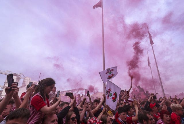 Southampton fans welcoming the team bus with flares