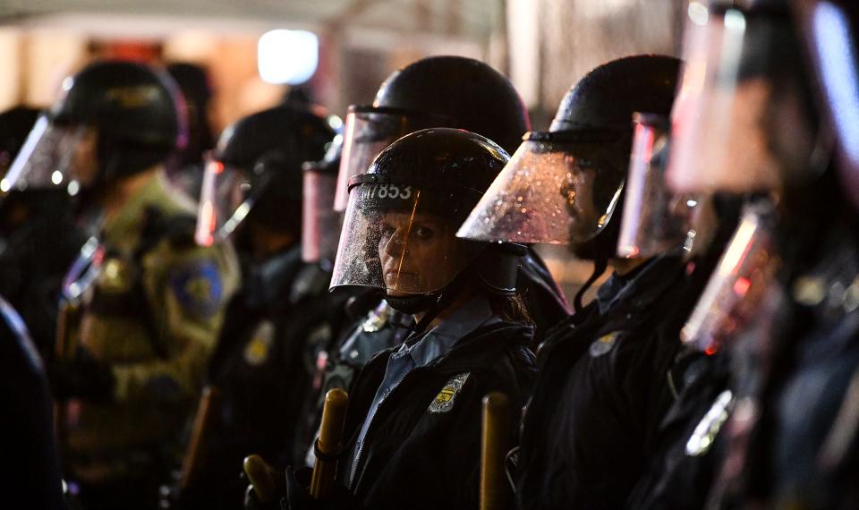 Officers form a line across First Avenue following the rally for Donald J. Trump Thursday, Oct. 10, 2019, outside the Target Center in Minneapolis. 