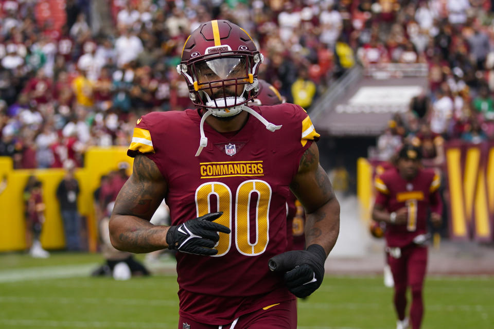 Washington Commanders defensive end Montez Sweat (90) taking the field to begin the first half of an NFL football game against the Philadelphia Eagles, Sunday, Oct. 29, 2023, in Landover, Md. (AP Photo/Alex Brandon)