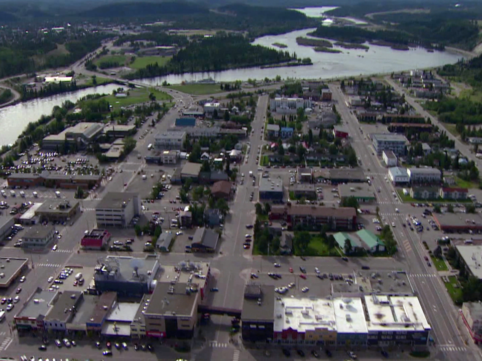 Downtown Whitehorse and the Riverdale neighbourhood across the river. Yukon Cares, an organization that sponsors refugee families, said it is having a difficult time finding accommodation in the city for two incoming families. (CBC - image credit)