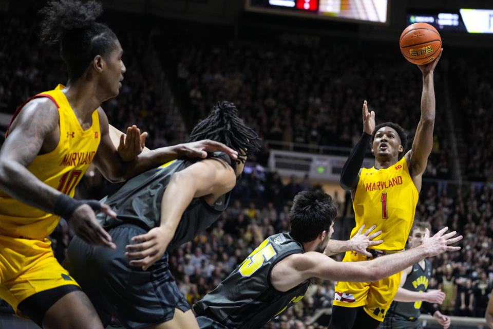 Maryland guard Jahmir Young (1) shoots over Purdue guard Ethan Morton (25) during the first half of an NCAA college basketball game in West Lafayette, Ind., Sunday, Jan. 22, 2023. (AP Photo/Michael Conroy)