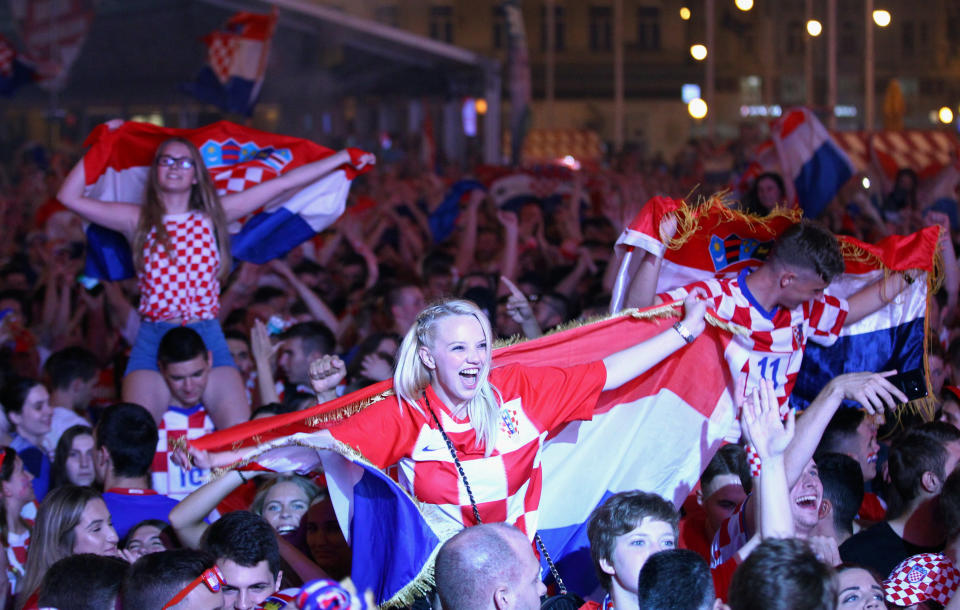 <p>Croatia fans celebrate in Zagreb after the team’s penalty kick win over Russia on Saturday. (Reuters) </p>