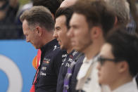 Red Bull team principal Christian Horner, left, pauses during the national anthem before the Formula One U.S. Grand Prix auto race at Circuit of the Americas, Sunday, Oct. 23, 2022, in Austin, Texas. (AP Photo/Darron Cummings)