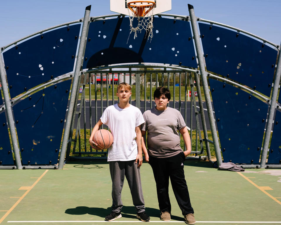 Garrett and Floyd on a Perryville basketball court. (Whitten Sabbatini for NBC News)