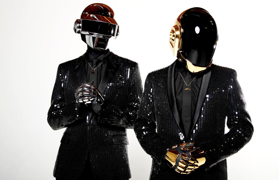 In this April 17, 2013 photo, Thomas Bangalter, left, and Guy-Manuel de Homem-Christo, from the music group, Daft Punk, pose for a portrait in Los Angeles. The electronic duo's new studio album, "Random Access Memories" releases in the US on May 21, 2013. (Photo by Matt Sayles/Invision/AP)